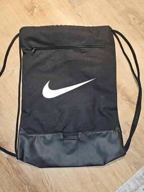 Nike Black Drawstring Backpack with White Swoosh